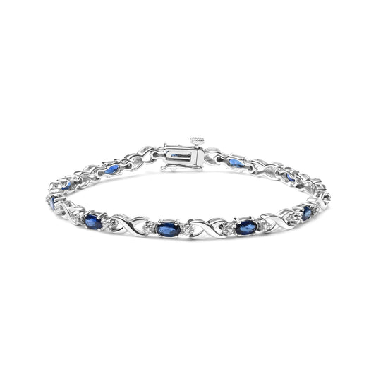 10K White Gold 5x4mm Oval Sapphire Gemstone and 1/10 Cttw Diamond Prong Set