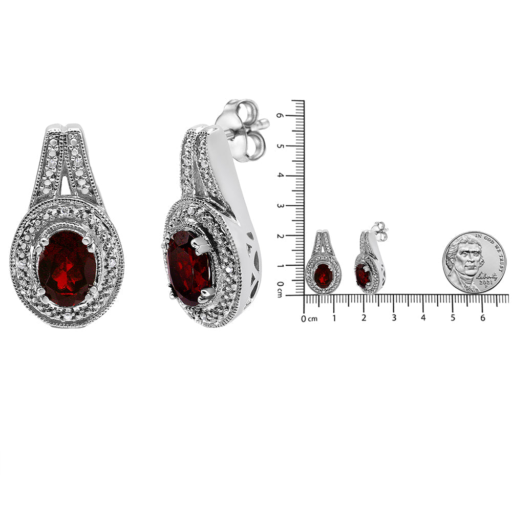 .925 Sterling Silver Diamond Accent and 8x6mm Red Oval Garnet Stud Earrings